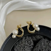 Aretes Perlas De Amor ® -Una expresión de calidad y elegancia.