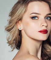 ARETES DE ACUPRESIÓN GLOW UP